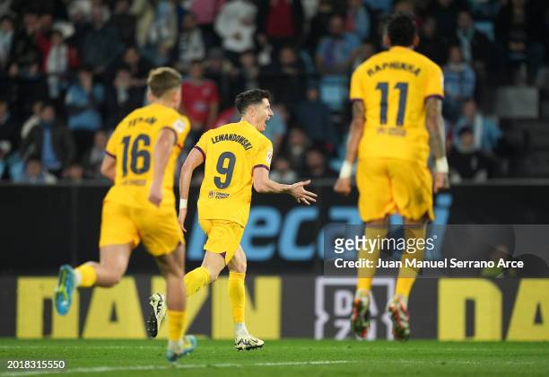 Robert Lewandowski of FC Barcelona celebrates scoring his team's second goal during the LaLiga EA Sports match between Celta Vigo and FC Barcelona at...