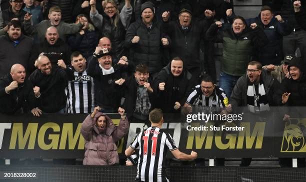 Newcastle player Matt Ritchie celebrates with the fans after scoring the second Newcastle goal to the Premier League match between Newcastle United...