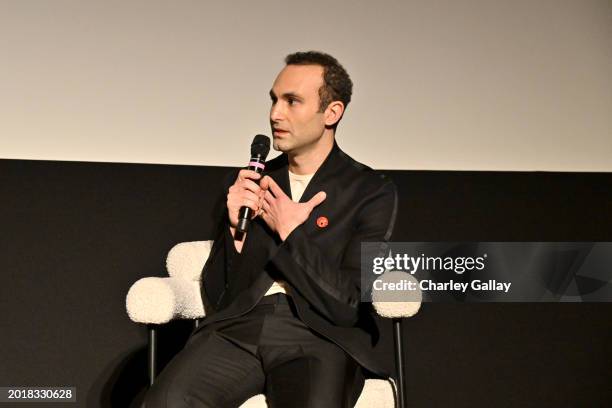 Khalid Abdalla speaks onstage during Netflix's "The Crown" S6 Tastemaker at DGA Theater Complex on February 16, 2024 in Los Angeles, California.