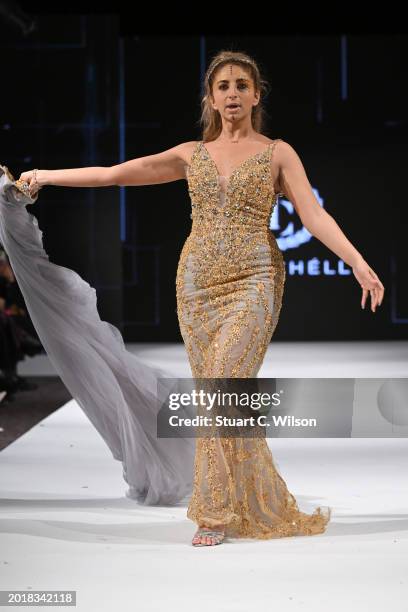 Model walks the runway for Tykorchelli at the House of iKons show during London Fashion Week February on February 17, 2024 in London, England.