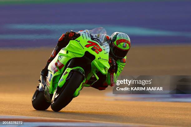 Pertamina Enduro VR46's Italian rider Marco Bezzecchi steers his bike on the second day of the MotoGP pre-season testing at the Lusail International...