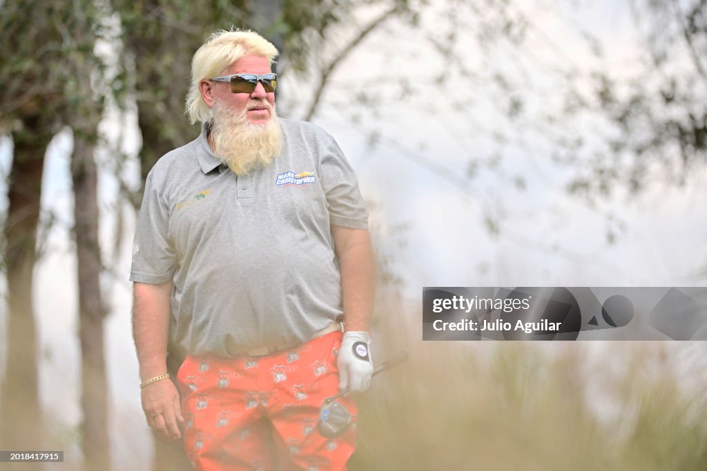 John Daly of the United States watches his ball after playing his