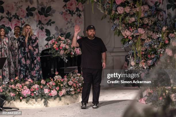 Designer Richard Quinn walks the runway at the Richard Quinn show during London Fashion Week February 2024 at Andaz Hotel on February 17, 2024 in...