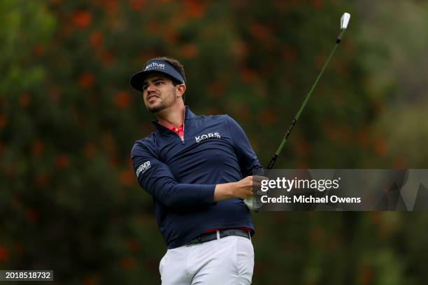 Beau Hossler of the United States tees off the fourth hole during the third round of The Genesis Invitational at Riviera Country Club on February 17,...