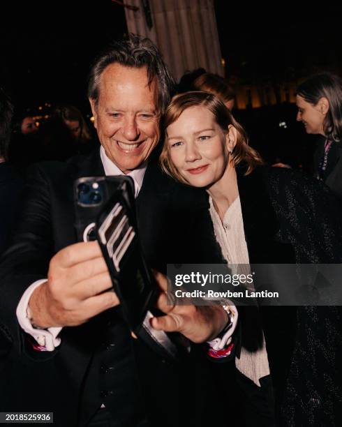 Richard E. Grant and Sandra Hüller attend the Nominees' Party for the EE BAFTA Film Awards 2024, supported by Bulgari at The National Gallery on...