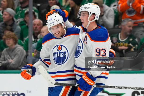 Derek Ryan of the Edmonton Oilers is congratulated by Ryan Nugent-Hopkins after scoring a goal during the second period against the Dallas Stars at...