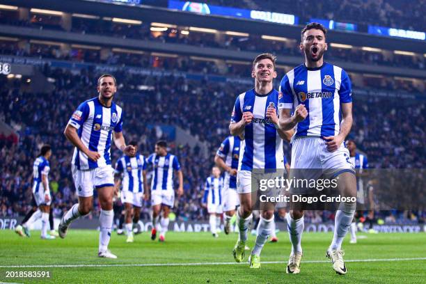 Joao Mario of FC Porto celebrates with team mates after scoring his team's second goal during the Liga Portugal Bwin match between FC Porto and...