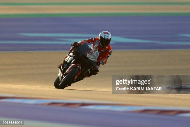 Ducati Lenovo's Italian rider Francesco Bagnaia steers his bike on the second day of the MotoGP pre-season testing at the Lusail International...