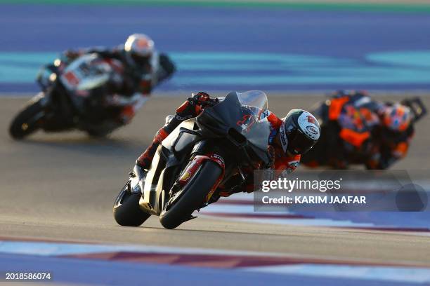 Ducati Lenovo's Italian rider Francesco Bagnaia steers his bike on the second day of the MotoGP pre-season testing at the Lusail International...