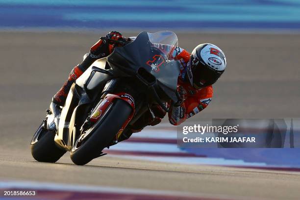 Ducati Lenovo's Italian rider Francesco Bagnaia steers his bike on the second day of the MotoGP pre-season testing at the Lusail International...