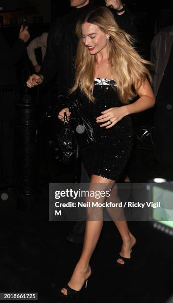 Margot Robbie arrives for the Charles Finch & Chanel 2024 Pre-BAFTA Party at 5 Hertford Street on February 17, 2024 in London, England.