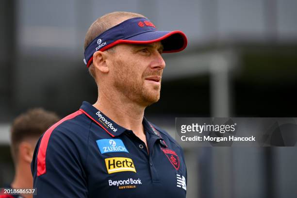 Simon Goodwin, Senior Coach of the Demons takes to the field ahead of an AFL practice match between Melbourne Demons and Richmond Tigers at Casey...