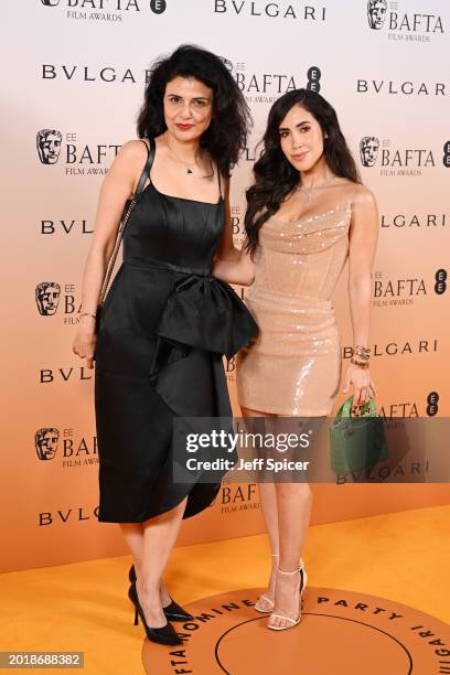 Stephania Morales and a guest attend the Nominees' Party for the EE BAFTA Film Awards 2024, supported by Bulgari at The National Gallery on February...