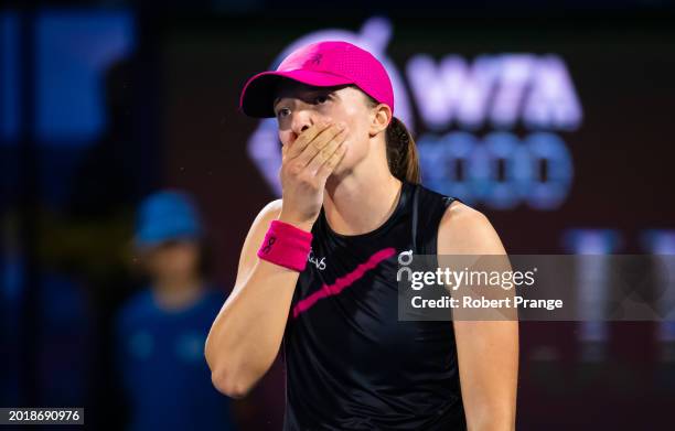 Iga Swiatek of Poland reacts in her match against Sloane Stephens of the United States in the second round on Day 3 of the Dubai Duty Free Tennis...