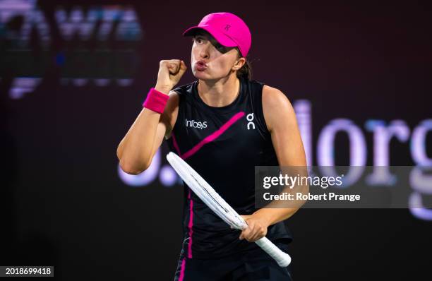 Iga Swiatek of Poland reacts in her match against Sloane Stephens of the United States in the second round on Day 3 of the Dubai Duty Free Tennis...