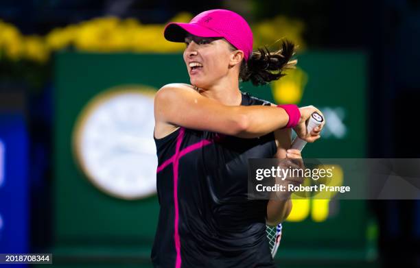 Iga Swiatek of Poland hits a forehand against Sloane Stephens of the United States in the second round on Day 3 of the Dubai Duty Free Tennis...