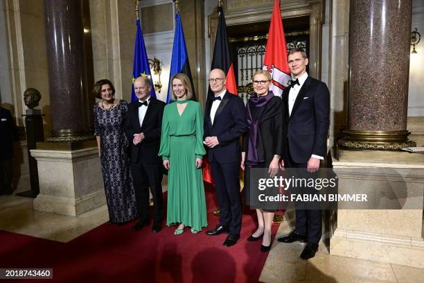 German Chancellor Olaf Scholz and his wife Britta Ernst , Estonia's Prime Minister Kaja Kallas and her husband Arvo Hallik , Hamburg's Mayor Peter...
