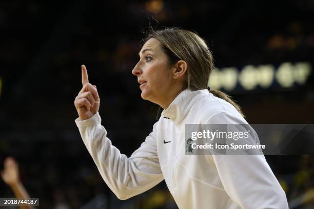 Michigan State Spartans head coach Robyn Fralick calls out a play during a regular season Big Ten Conference college women's basketball game between...