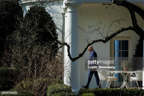 President Joe Biden exits the Oval Office of the White House before boarding Marine One in Washington, DC, US, on Tuesday, Feb. 20, 2024. Biden...