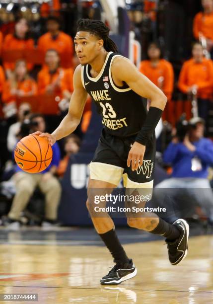 Wake Forest Demon Deacons guard Hunter Sallis dribbles the ball up the court during a men's college basketball game between the Wake Forest Demon...