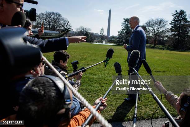 President Joe Biden speaks to members of the media on the South Lawn of the White House before boarding Marine One in Washington, DC, US, on Tuesday,...