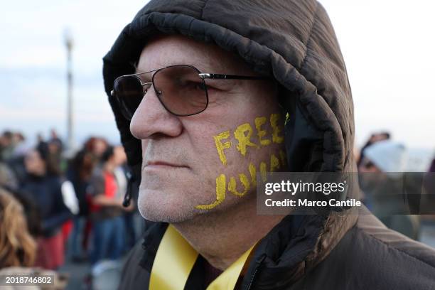 Man with writing on his face during the demonstration in support of the activist Julian Assange, to ask that he not be extradited from England, where...