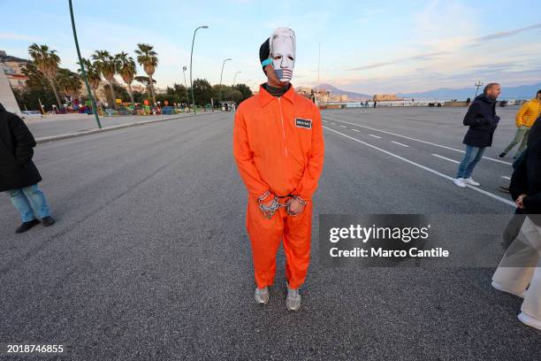 Man dressed as a prisoner and a mask with Assange's face during the demonstration in support of the activist Julian Assange, to ask that he not be...