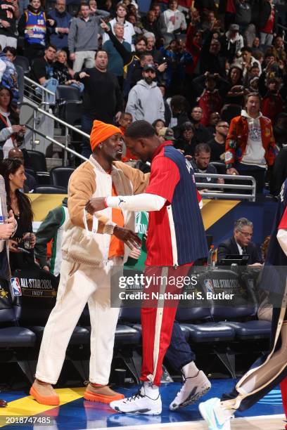 Gary Payton greets Anthony Edwards of the Western Conference during the NBA All-Star Game as part of NBA All-Star Weekend on Sunday, February 18,...