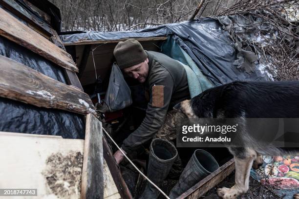 Ukrainian soldier in a shelter at his fighting position in the direction of Bakhmut, Donetsk Oblast, Ukraine, 20 February 2024