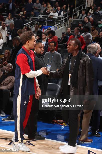 Trae Young of the Eastern Conference greets Ahmad Rashad during the NBA All-Star Game as part of NBA All-Star Weekend on Sunday, February 18, 2024 at...