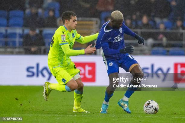 Yasin Ayari of Blackburn Rovers challenges Jamilu Collins of Cardiff City for the ball during the Sky Bet Championship match between Cardiff City and...