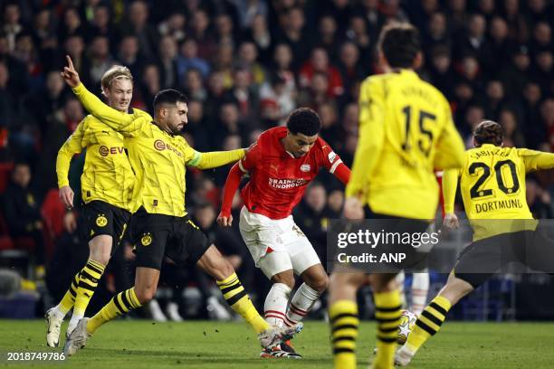 Emre Can of Borussia Dortmund, Malik Tillman of PSV Eindhoven during the UEFA Champions League last 16 match between PSV Eindhoven and Borussia...