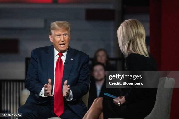 Former US President Donald Trump, left, speaks with Laura Ingraham, host of The Ingraham Angle on Fox News Channel, during a Fox News town hall in...