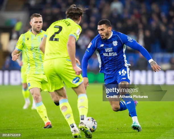 Karlan Grant of Cardiff City attacks with pressure from Callum Brittain of Blackburn Rovers during the Sky Bet Championship match between Cardiff...