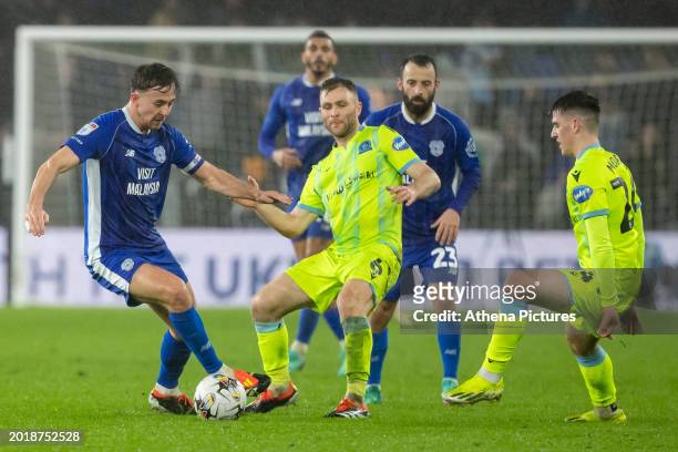 Ryan Wintle of Cardiff City and Sondre Tronstad of Blackburn Rovers battle for the ball during the Sky Bet Championship match between Cardiff City...