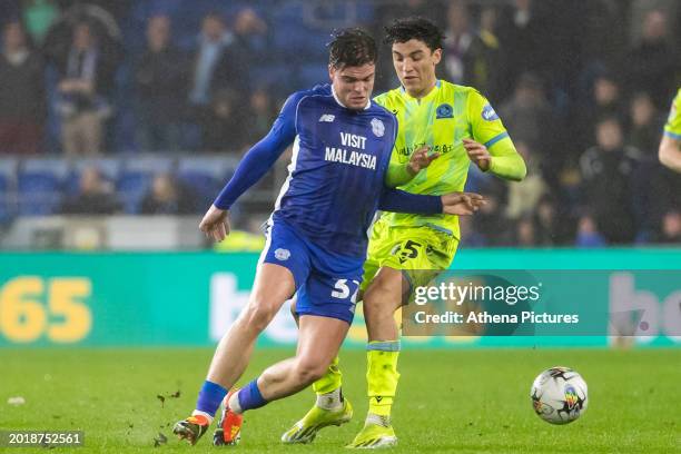 Ben Chrisene of Blackburn Rovers and Ollie Tanner of Cardiff City battle for the ball during the Sky Bet Championship match between Cardiff City and...