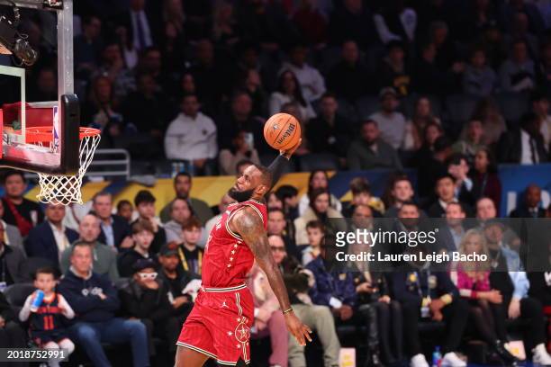 LeBron James of the Western Conference dunks the ball during the NBA All-Star Game as part of NBA All-Star Weekend on Sunday, February 18, 2024 at...