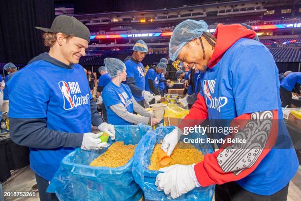 Alondes Williams and Mac McClung of Team Detlef smile during the NBA Cares 24 Hour DOS Closing Ceremony as part of NBA All-Star Weekend on Friday,...