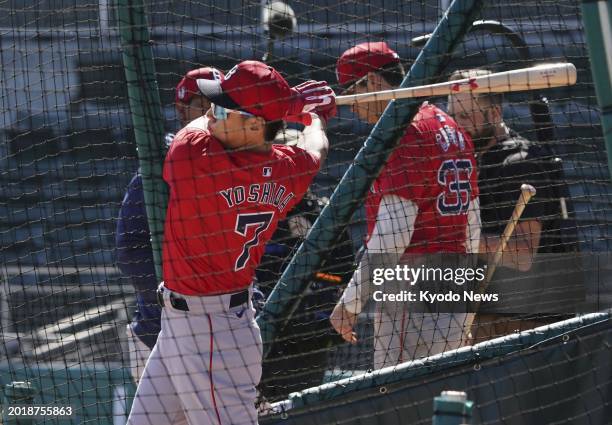 Masataka Yoshida of the Boston Red Sox takes batting practice during baseball spring training on Feb. 20 in Fort Myers, Florida.