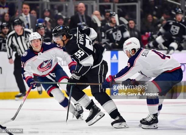Quinton Byfield of the Los Angeles Kings and Cole Sillinger of the Columbus Blue Jackets battles for position during the first period at Crypto.com...