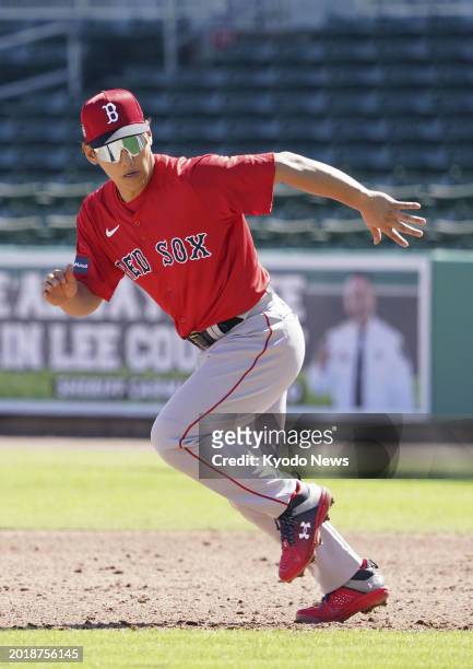Masataka Yoshida of the Boston Red Sox practices base running during baseball spring training on Feb. 20 in Fort Myers, Florida.