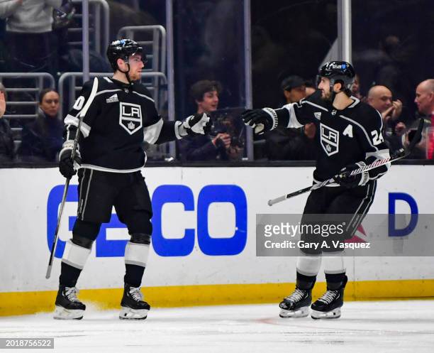 Pierre-Luc Dubois of the Los Angeles Kings celebrates his goal with Phillip Danault during the second period against the Columbus Blue Jackets at...