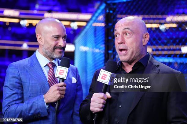 Jon Anik and Joe Rogan anchor the broadcast during the UFC 298 event at Honda Center on February 17, 2024 in Anaheim, California.