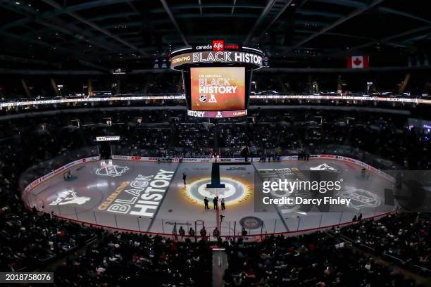 General view of the arena bowl on-ice projections for the pre-game ceremony celebrating Black History prior to NHL action between the Winnipeg Jets...