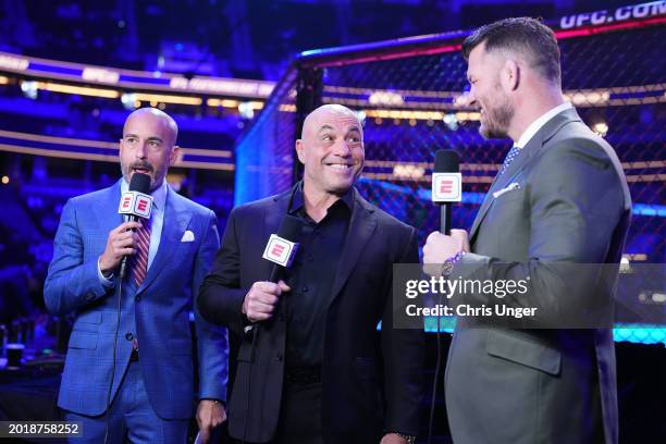 Jon Anik, Joe Rogan, and Michael Bisping anchor the broadcast during the UFC 298 event at Honda Center on February 17, 2024 in Anaheim, California.