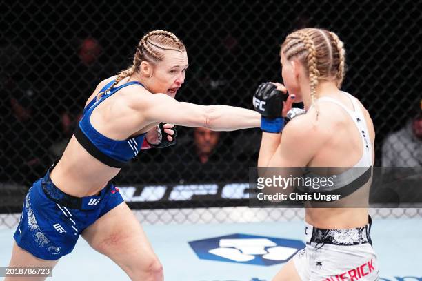 Andrea Lee punches Miranda Maverick in a flyweight fight during the UFC 298 event at Honda Center on February 17, 2024 in Anaheim, California.