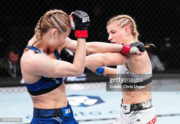 Miranda Maverick punches Andrea Lee in a flyweight fight during the UFC 298 event at Honda Center on February 17, 2024 in Anaheim, California.