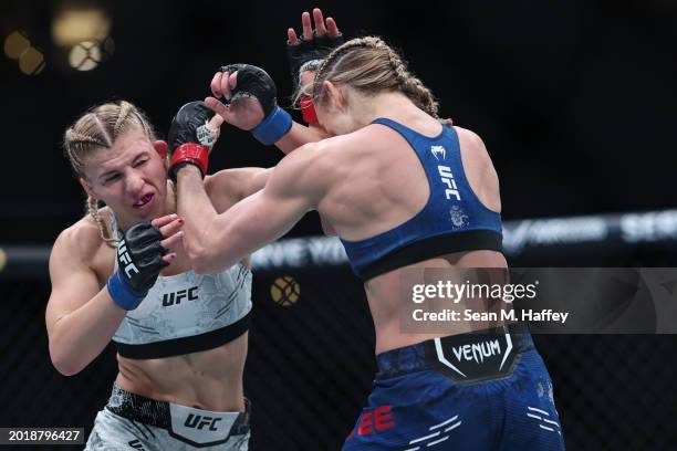 Miranda Maverick exchanges strikes with Andrea Lee during their women's flyweight fight during UFC 298 at Honda Center on February 17, 2024 in...
