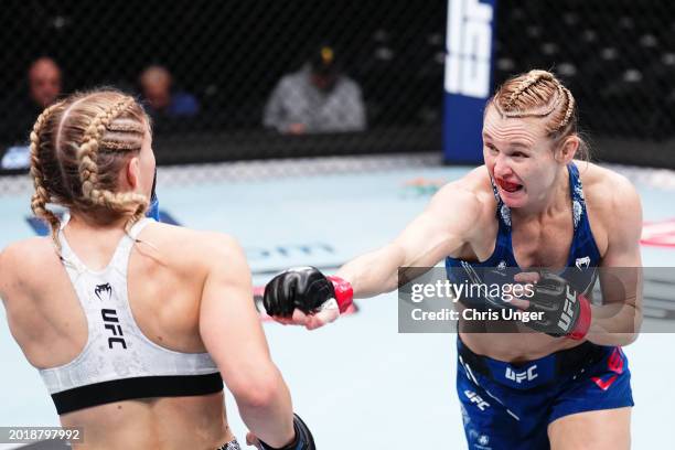 Andrea Lee punches Miranda Maverick in a flyweight fight during the UFC 298 event at Honda Center on February 17, 2024 in Anaheim, California.