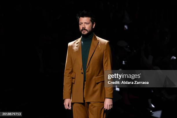 Actor Alvaro Morte walks the runway at the Elio Berhanyer fashion show during the Mercedes Benz Fashion Week Madrid at Ifema on February 17, 2024 in...